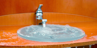 How do I disassemble a sink drain