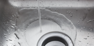 How do you flush a drain