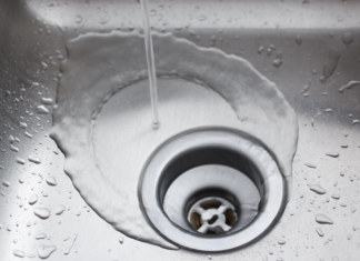 How do you flush a drain