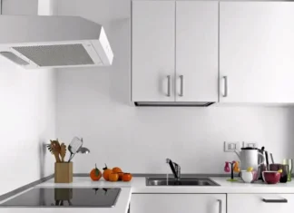 How do I clean my kitchen hoods and filters